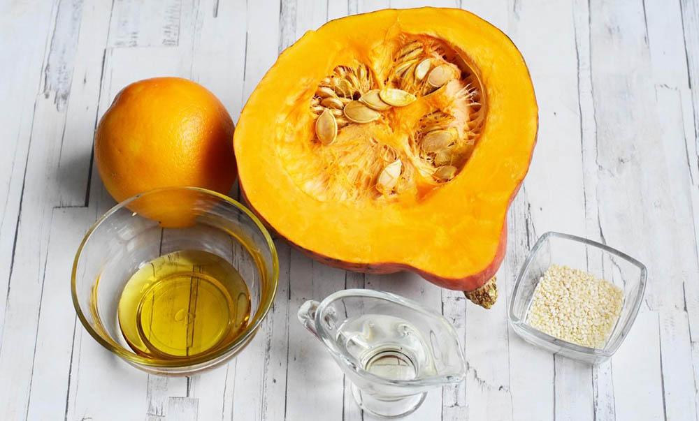 Ингредиенты для приготовления тыквы в духовке Тыква, мёд, кунжут и апельсин